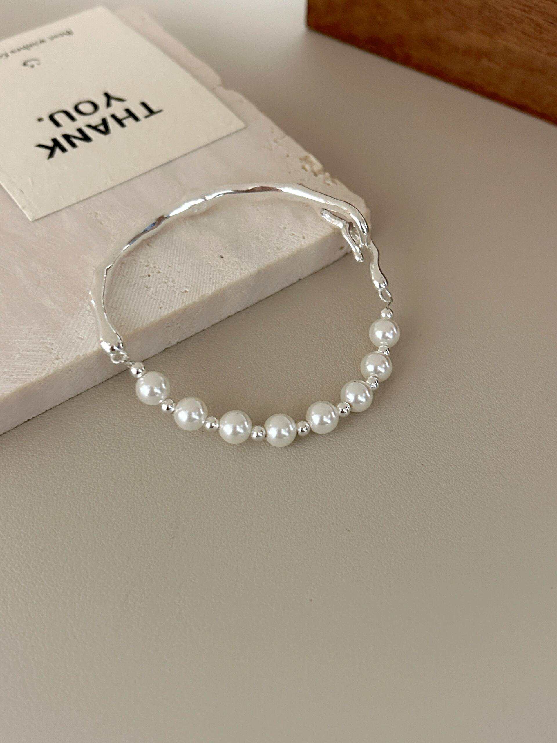 Pearl & Wave Bangle Bracelet – Elegant and Unique